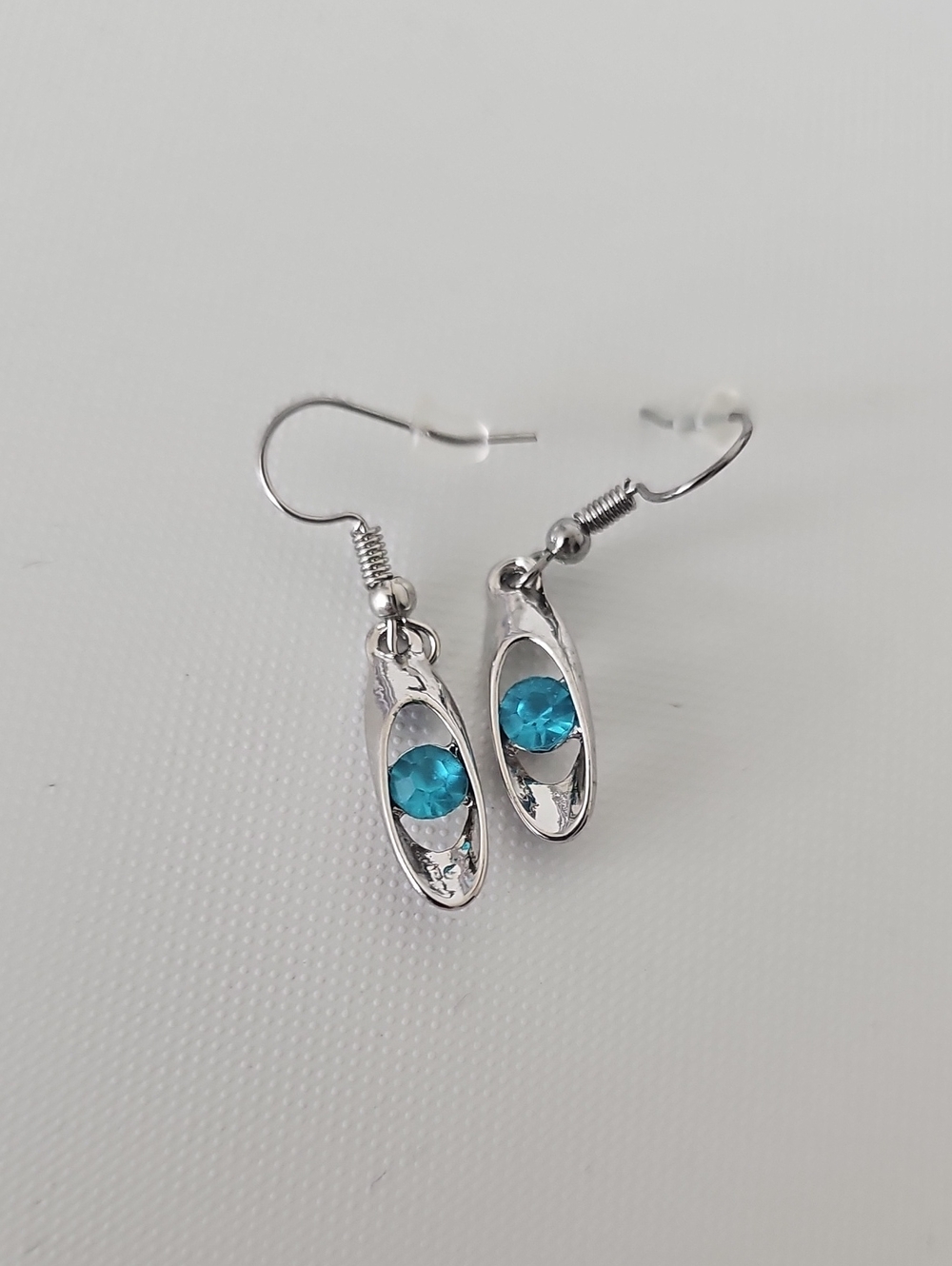 Silver Drop Earrings with Blue Crystal Accent